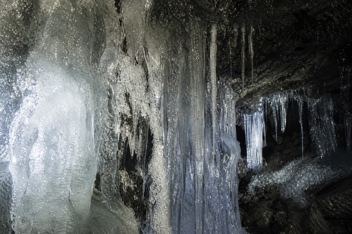 Inside the natural ice formations of a Mt. Fuji lava-tube cave
